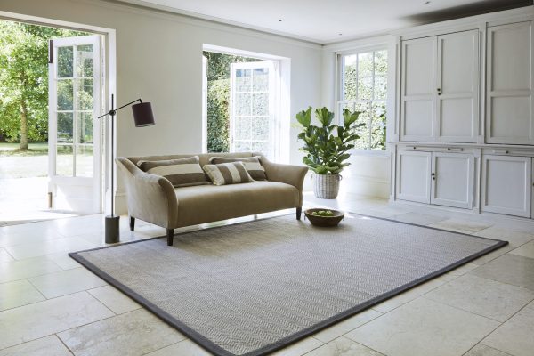 1. Natural Weave Herringbone Grey with Linen Vole border rug by Jacaranda a